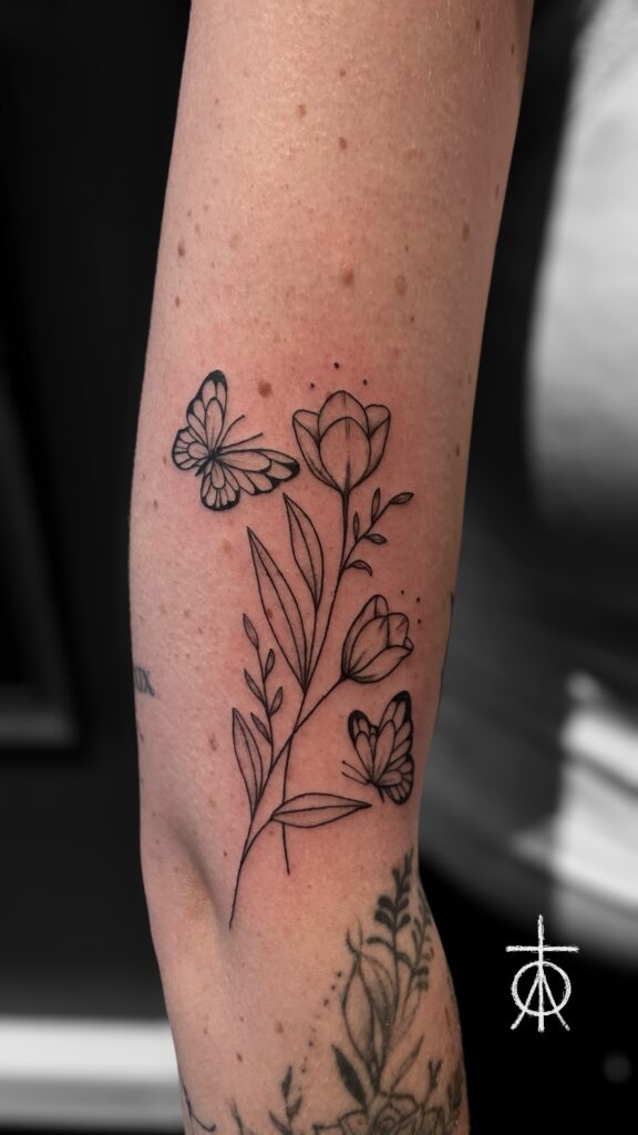 The best Fine Line Floral tattoo