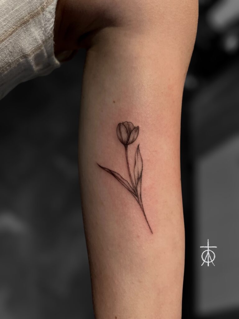 Micro Tulip Tattoo by The Best Tattoo Artist Claudia Fedorovicio